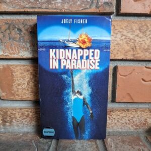 ** 4/$25 VHS **Kidnapped in Paradise (VHS, 1999) Vintage - 90's - Good Used Cond